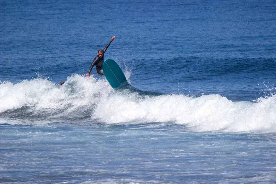 Surfing at Black Sand Box, São Miguel