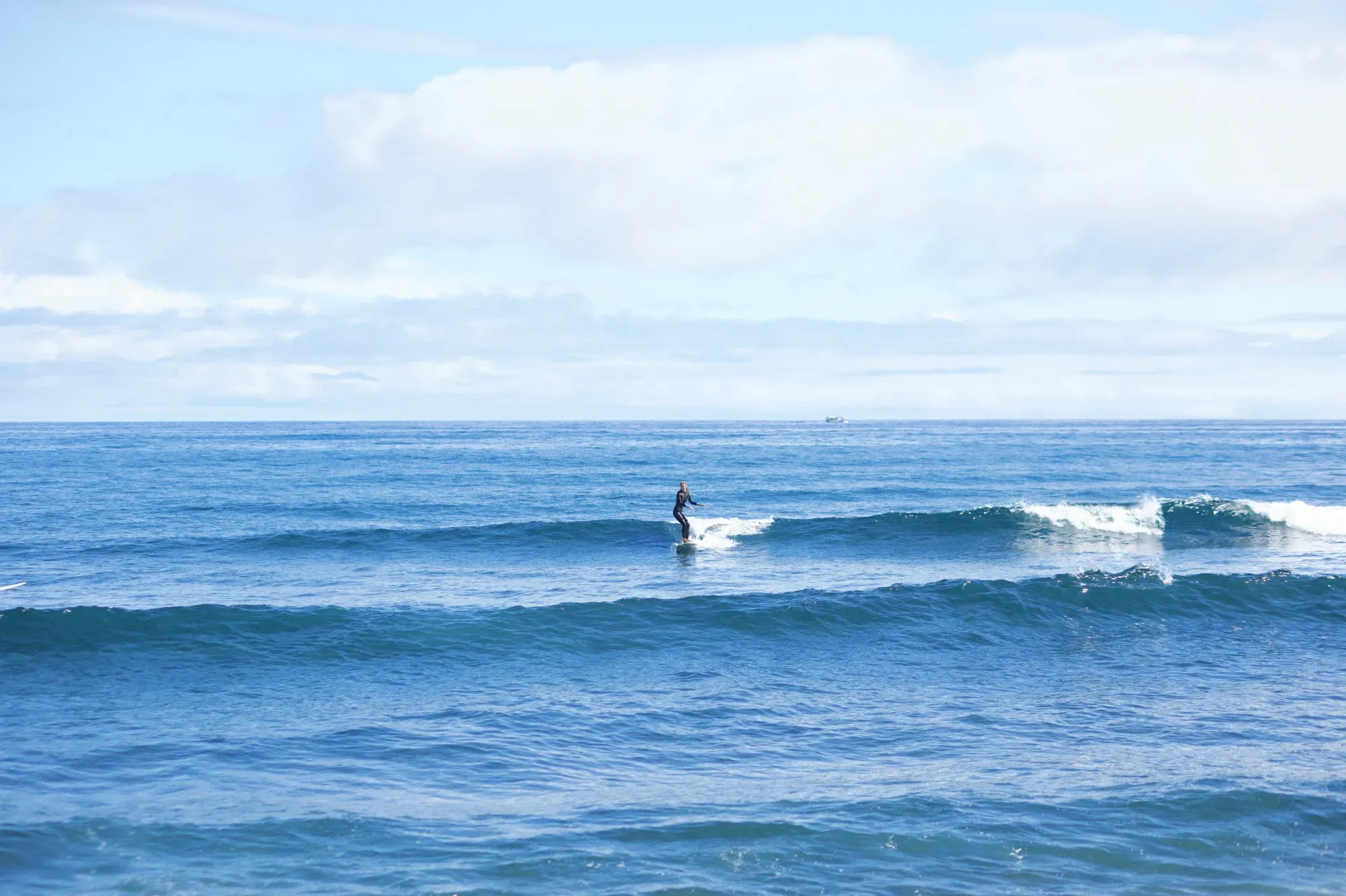 Surfing at Black Sand Box, São Miguel
