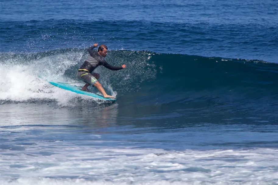 Surfing at Black Sand Box, São Miguel