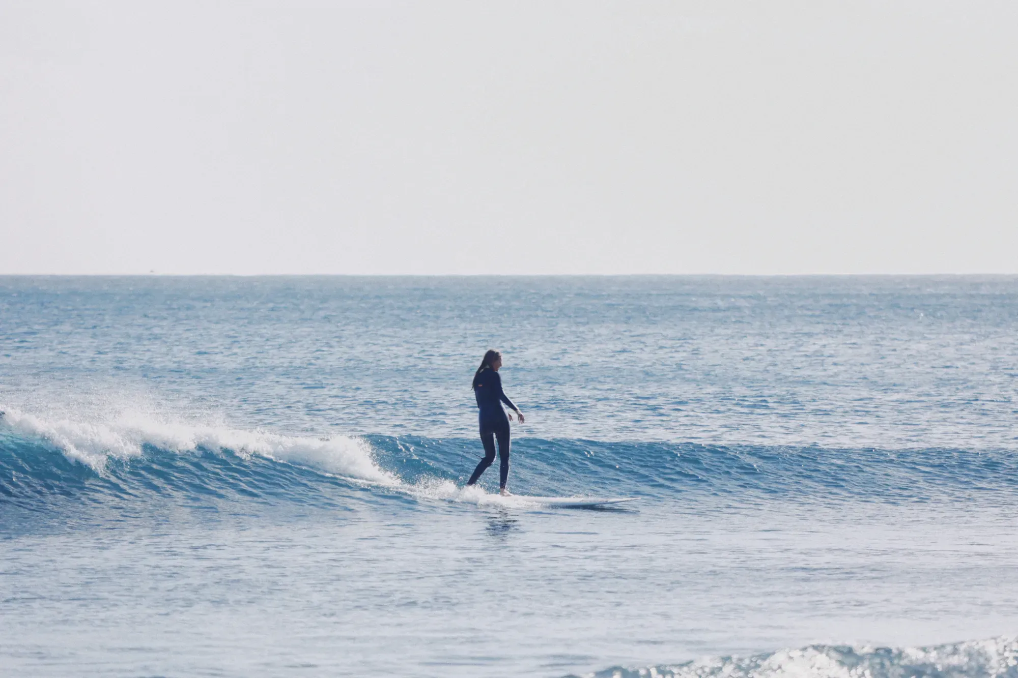Surfing at Black Sand Box, São Miguel